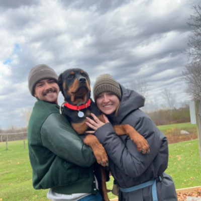Happy family taking home their Ohio Rottweilers puppy